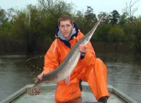 Vasyl Tkach with longnose gar 14Mar2009.webp