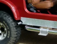 Side look at chrome exhaust & aluminum.webp