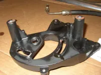 Power steering pump bracket one-half.webp