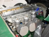 1962_Jaguar_E_Type_FHC_Vintage_Race_Car_Engine_1.webp