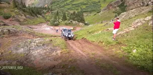 Bill%20going%20up%20the%20chute.webp