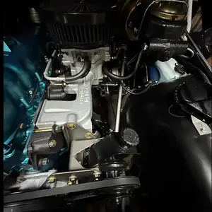 Driver’s side of engine compartment