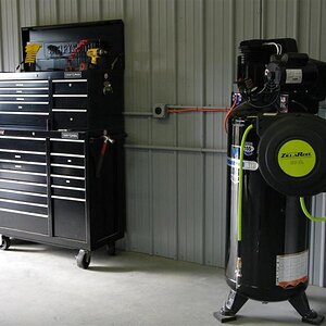 Tools And Air Compressor In My Garage