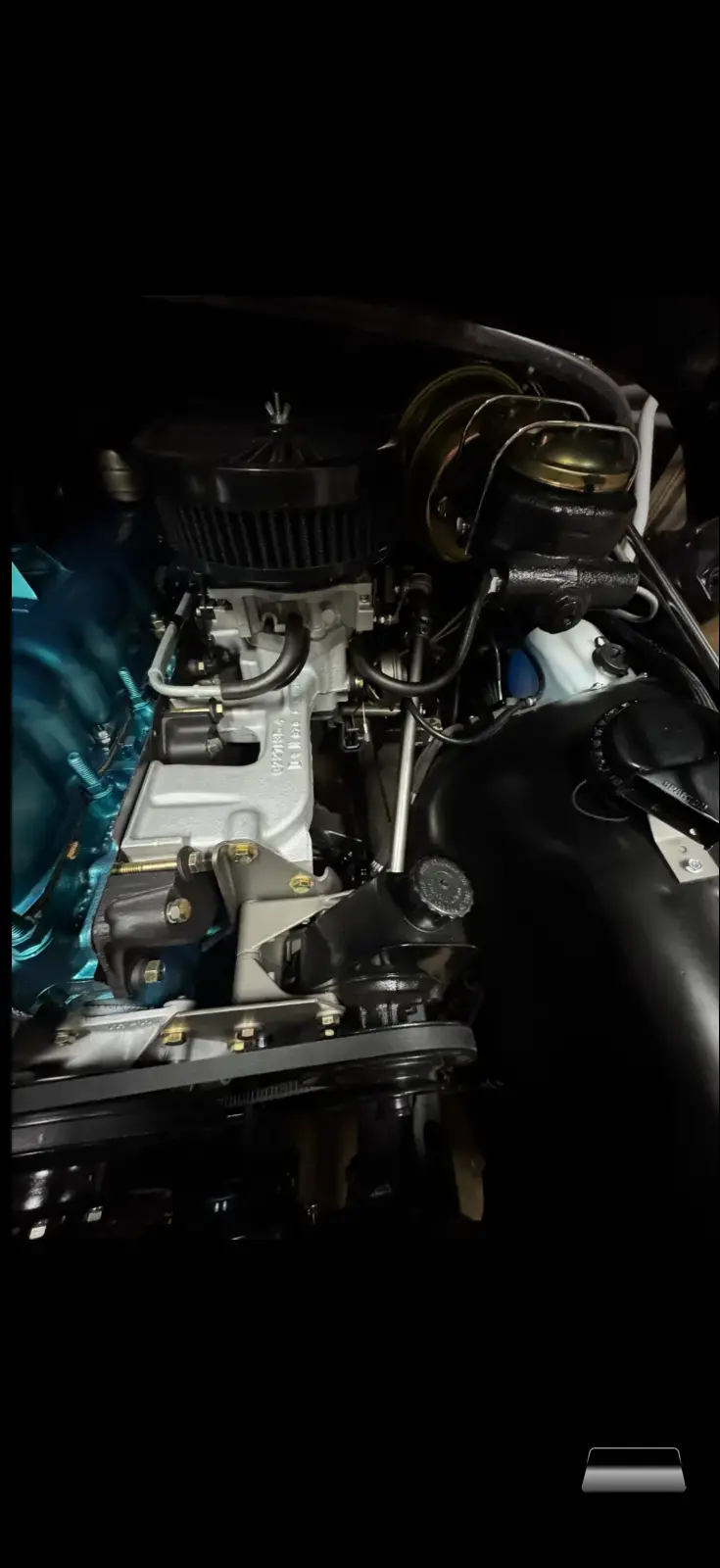 Driver’s side of engine compartment