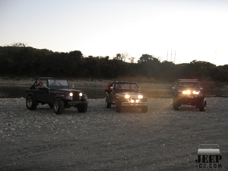 Jeeps In The River